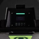 A close-up shot of a digital control panel with a glowing green light and four buttons reading: "Power", "Purge", "Next", "Set". The screen reads "Powering up... compressor is ready in 00:14".